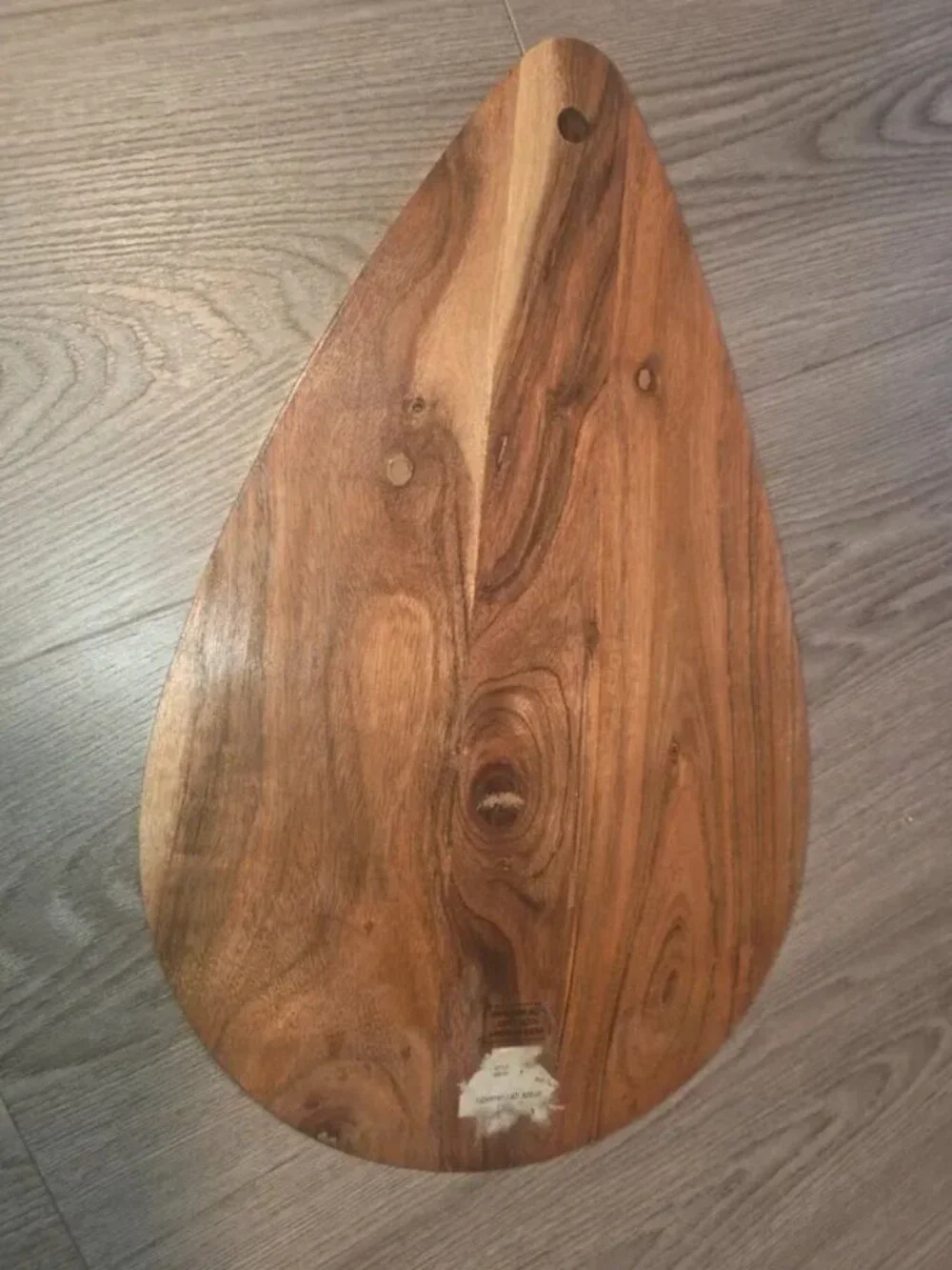 Wood and resin decorative cutting board, teardrop/surfboard shape with ikat patt